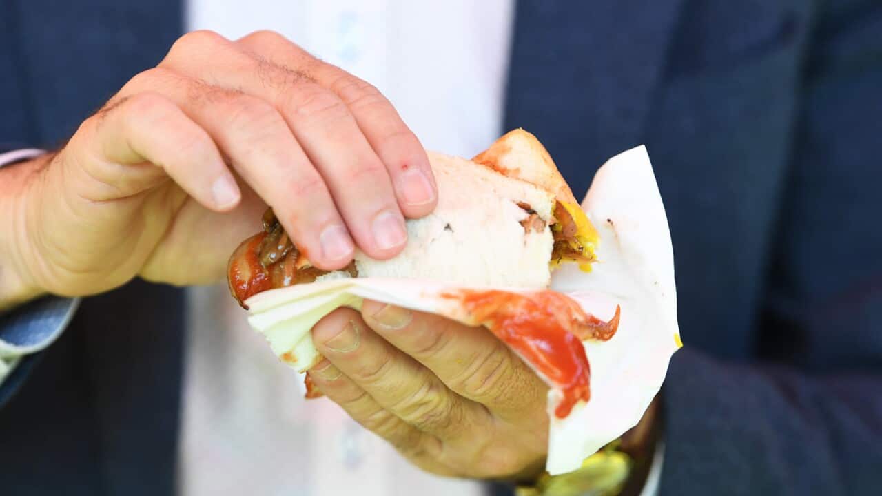 A democracy sausage ready to be eaten on election day (AAP)