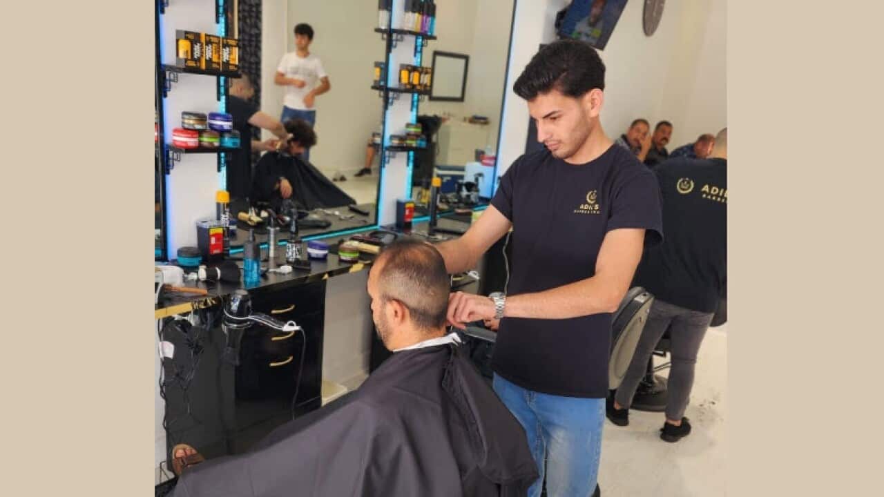 Adil sulaiman cutting hair.jpg