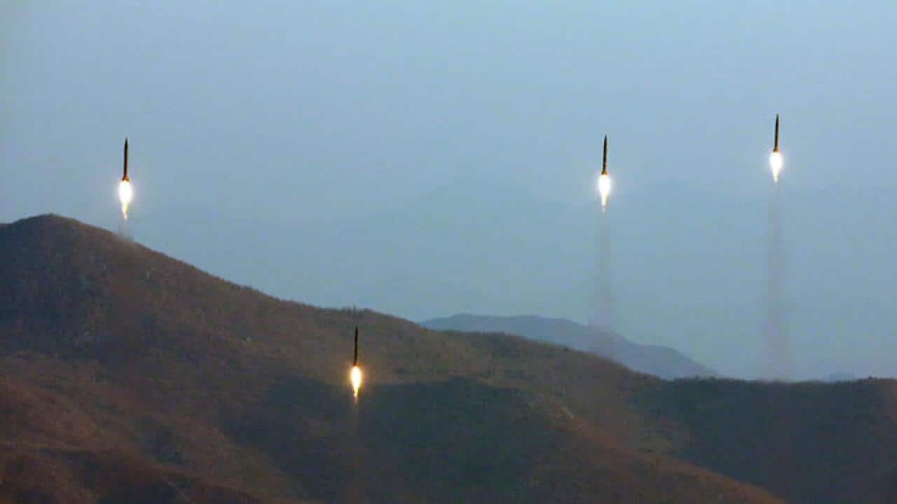 File Image: Four projectiles during a ballistic rocket launching drill