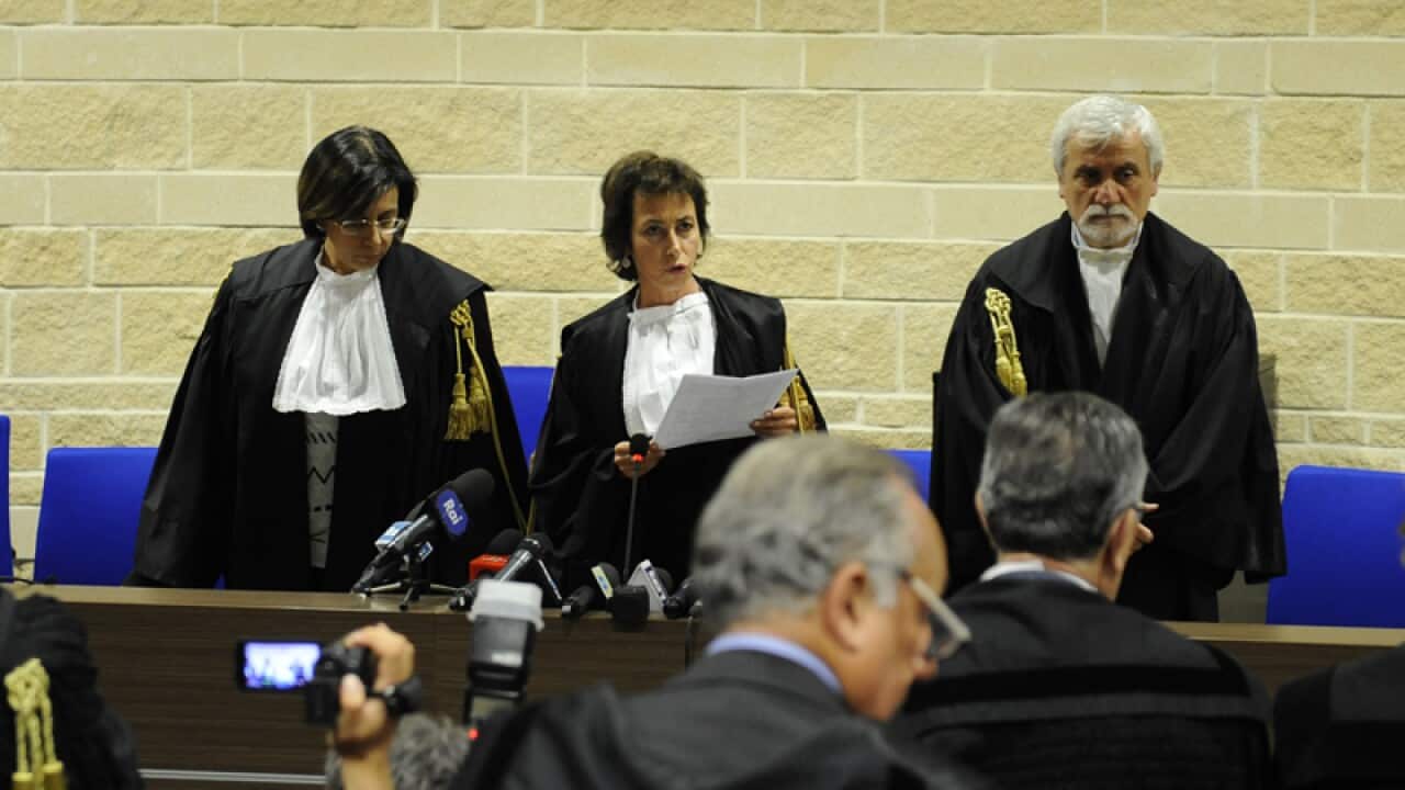 Judges reads the appeal sentence clearing seven scientists in Italy
