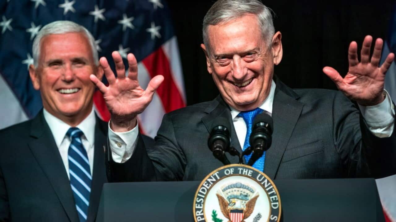 US Secretary of Defense James Mattis (R) introduces US Vice President Mike Pence (L)