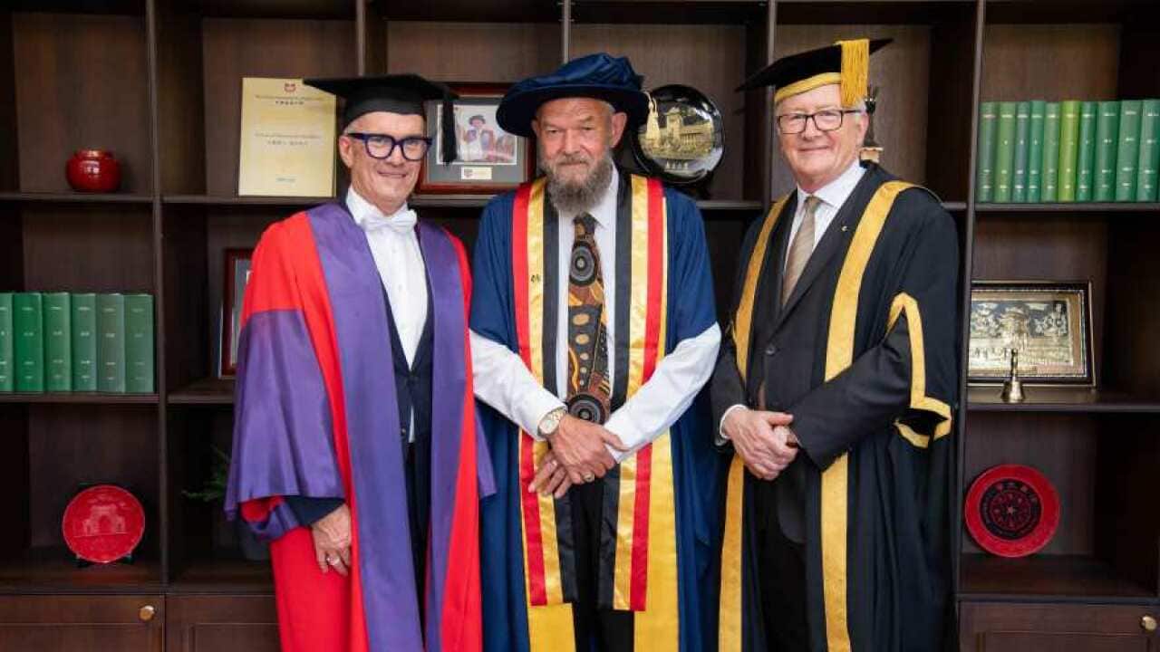 Professor Brendan McCormack, Adjunct Professor Scott Wilson, and Presiding Pro-Chancellor, Professor Stephen Garton.