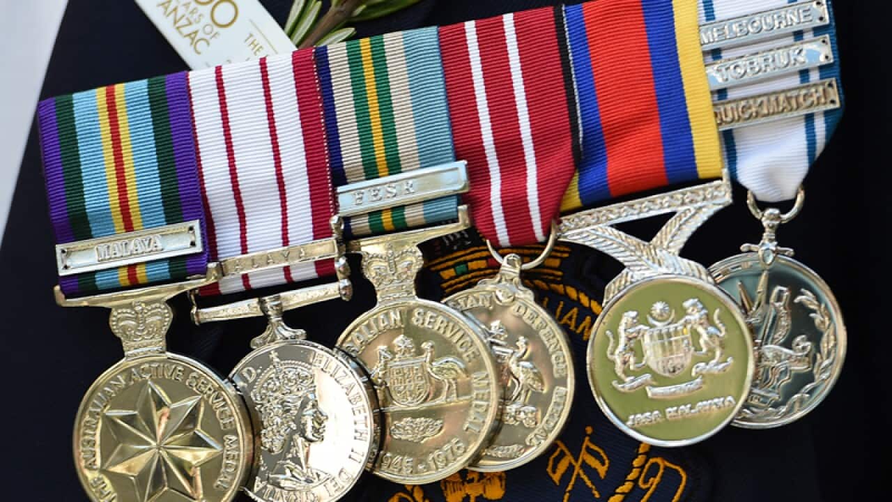 Medals are worn by an ex-serviceman