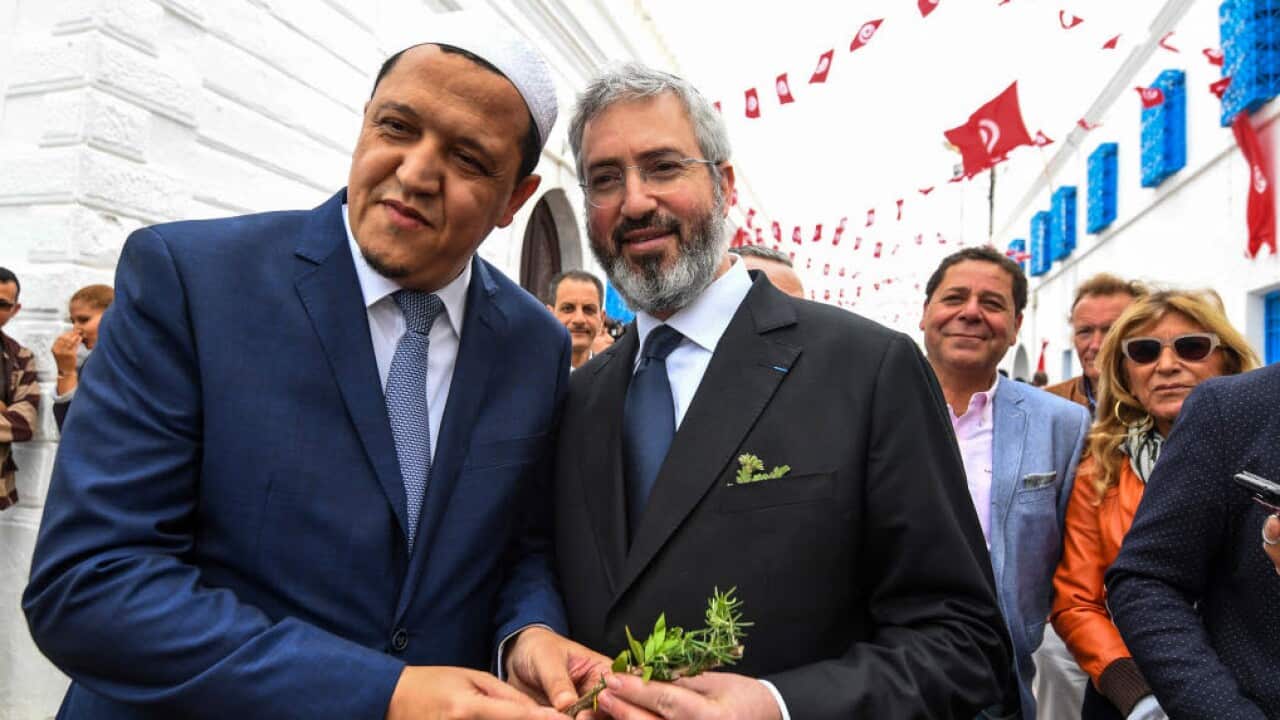 Hassen Chalghoumi, left, the administrative responsible of the municipal Drancy mosque in Seine-Saint-Denis, with rabbi Moshe Sebbag (Getty Images)