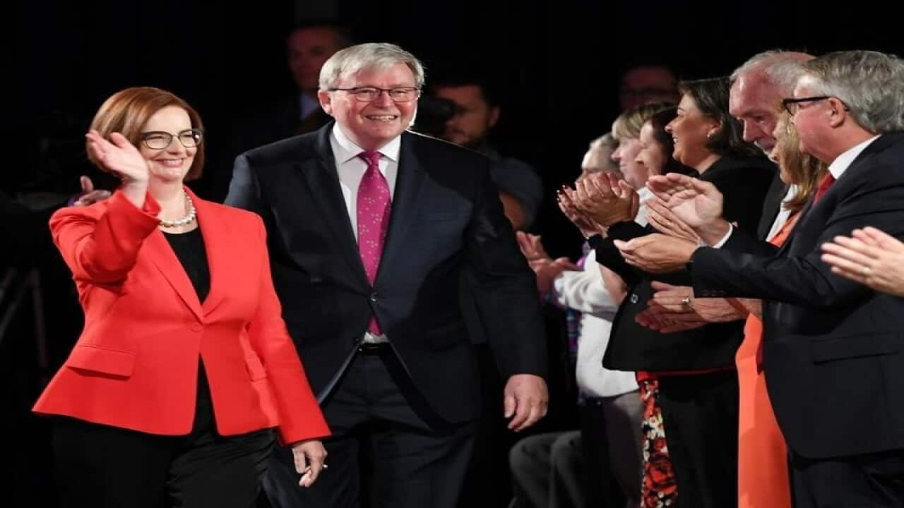 Julia Gillard and Kevin Rudd arrive at Labor's campaign launch.