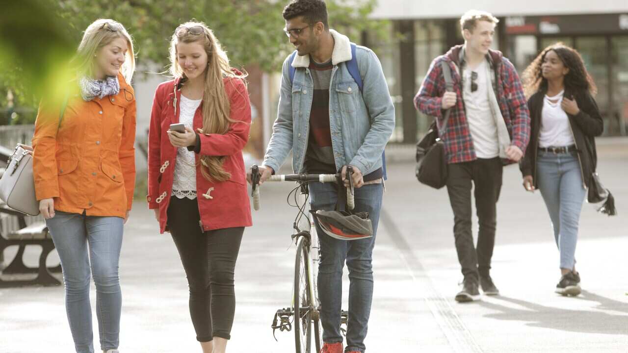 Students walking outside university