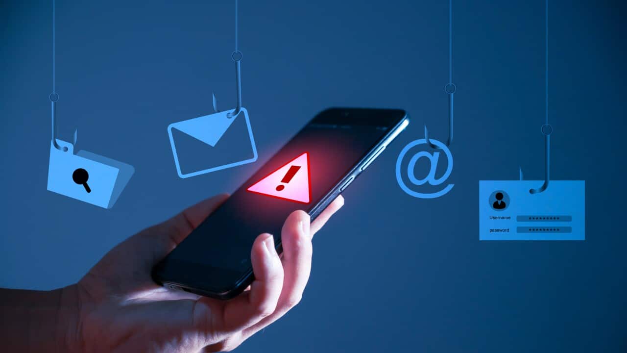 Username and password' on a fishing hook. Conceptual image about the risk of internet identity theft, also known as Phishing. fishing rod is harvesting user data in cyberspace.