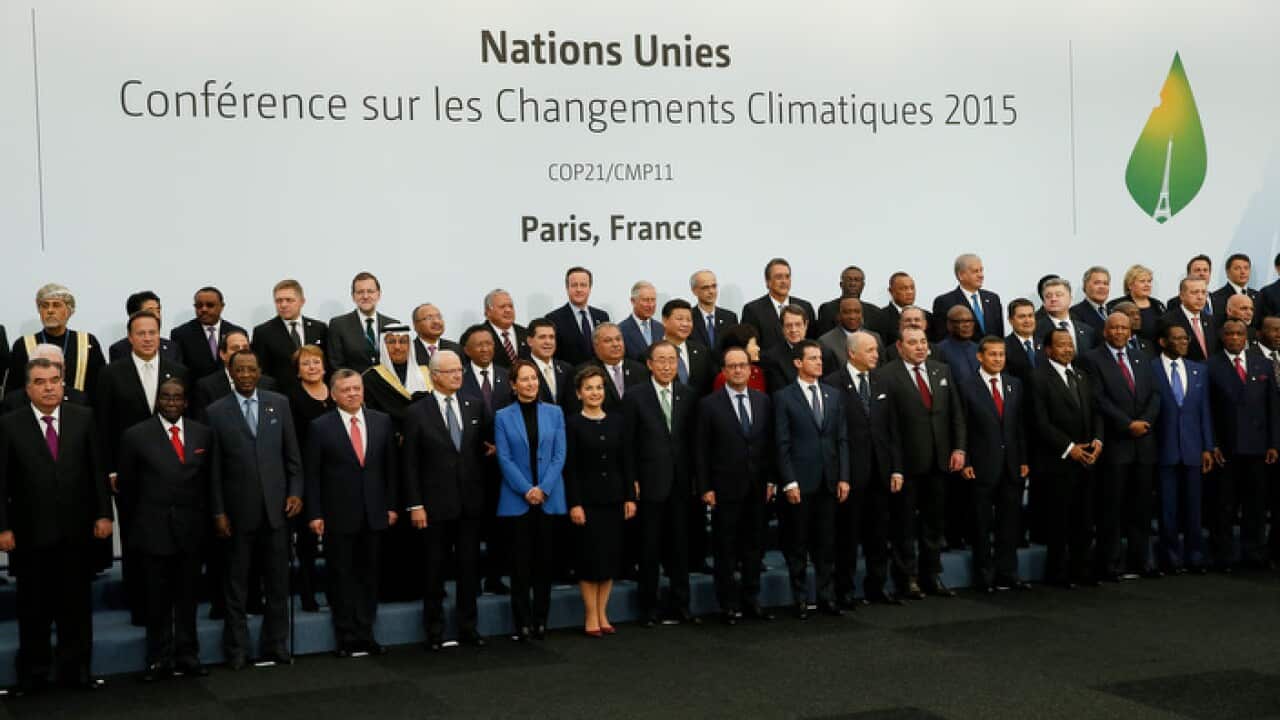 World leaders pose for a group photo at the COP21, United Nations Climate Change Conference, in Le Bourget, outside Paris, Monday, Nov. 30, 2015. (Ian Langsdon, Pool via AP)