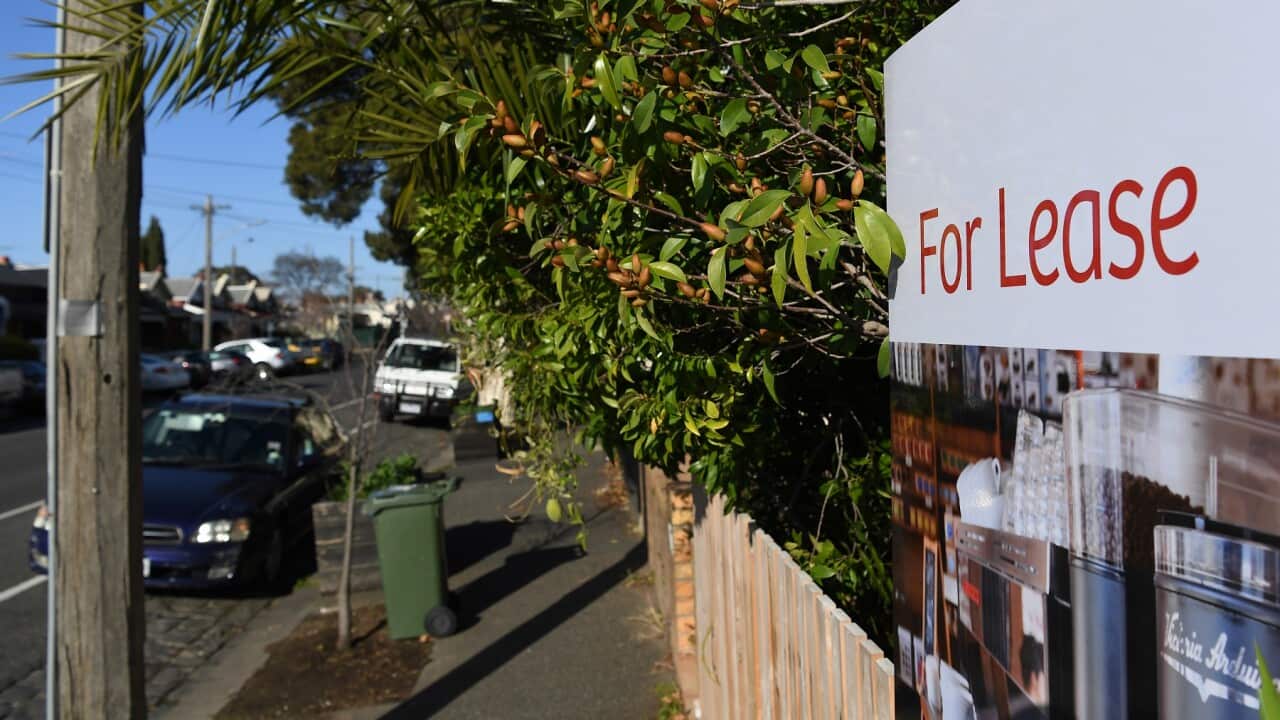Signage for a real estate property is seen in Carlton North, Melbourne, Wednesday, July 18, 2018. (AAP Image/James Ross) NO ARCHIVING