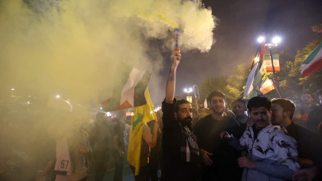 Iranians celebrate following missile attack against Israel