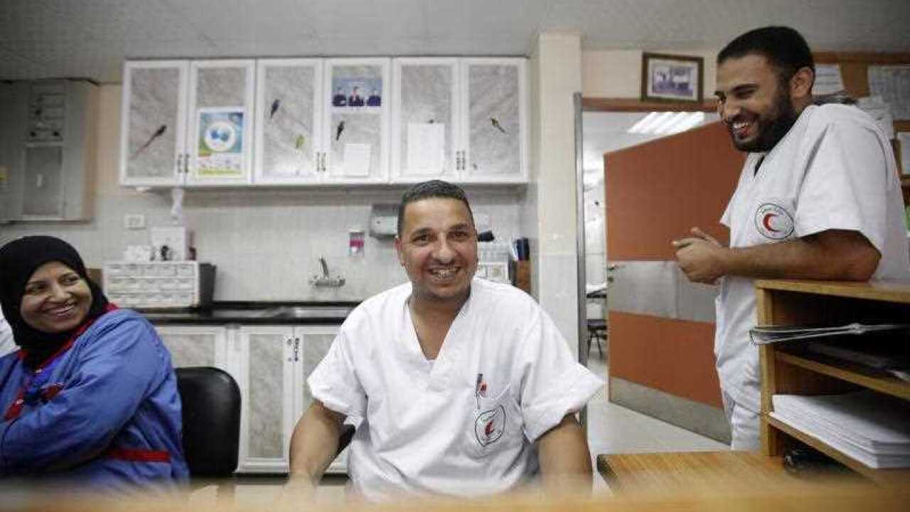 Gaza: Nurses of the pediatric department at Shifa hospital, in Gaza, smiles,