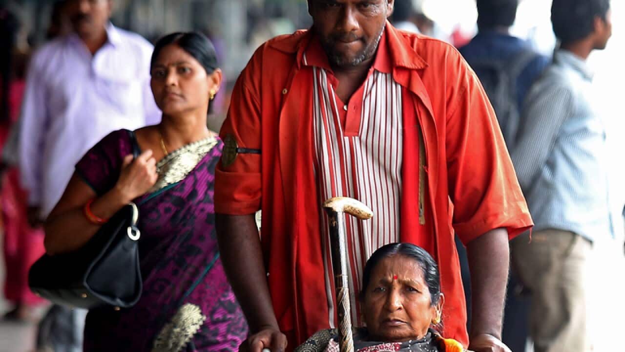 An Indian railway helper, known as a "coolie"