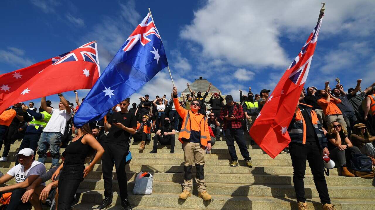 Protesters are seen at a demonstration against mandatory Covid-19 vaccinations at the Shrine of Remembrance.
