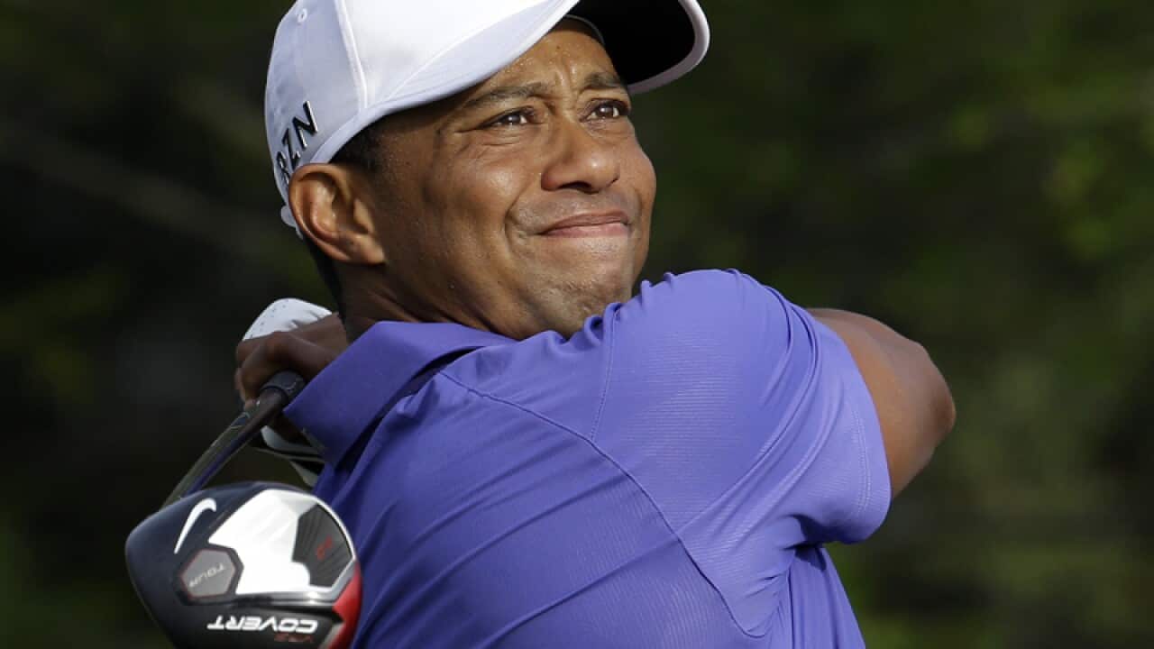 Tiger Woods reacts