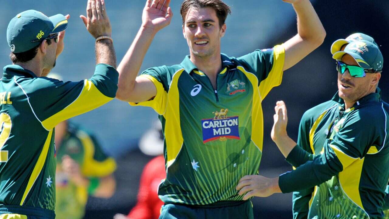 Pat Cummins of Australia (C) celebrates with teammates