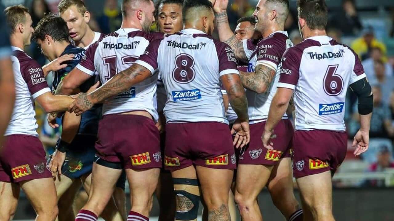 Sea Eagles players celebrate