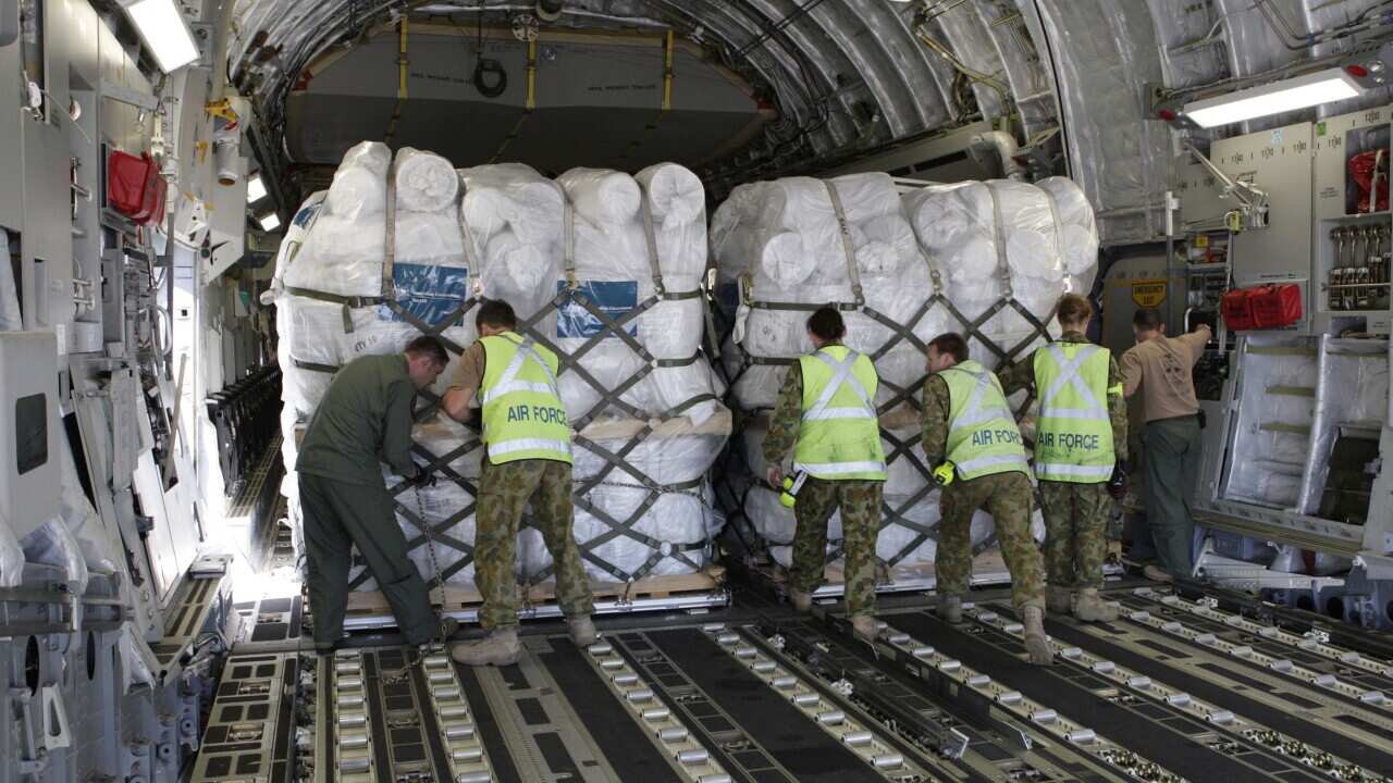 OVERSEAS AID_aid work2_140513_AAP.jpg