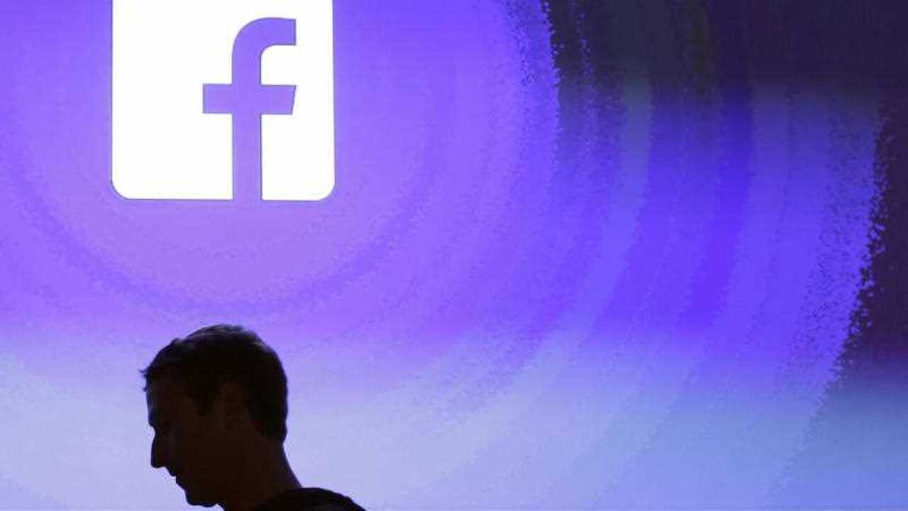 In this April 4, 2013 file photo, Facebook CEO Mark Zuckerberg walks at the company's headquarters.