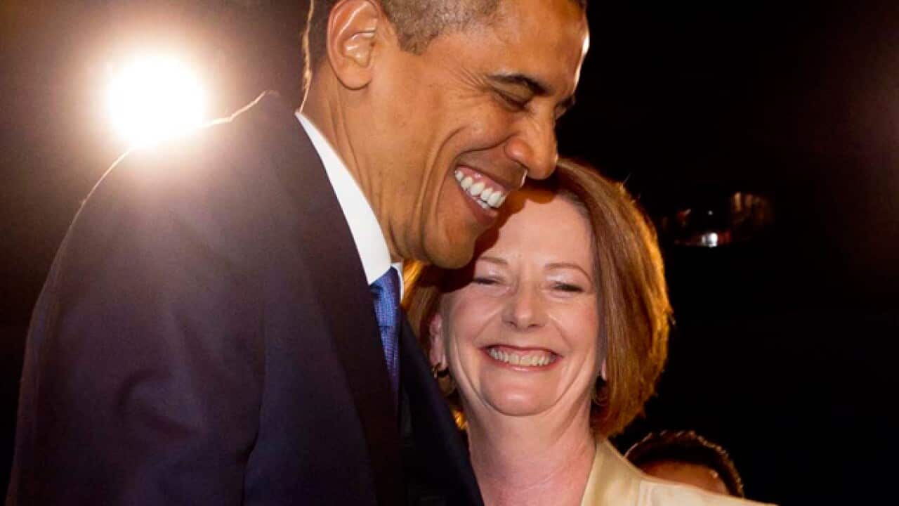 Gillard_Obama_hug_111105_B_aap_1497030304
