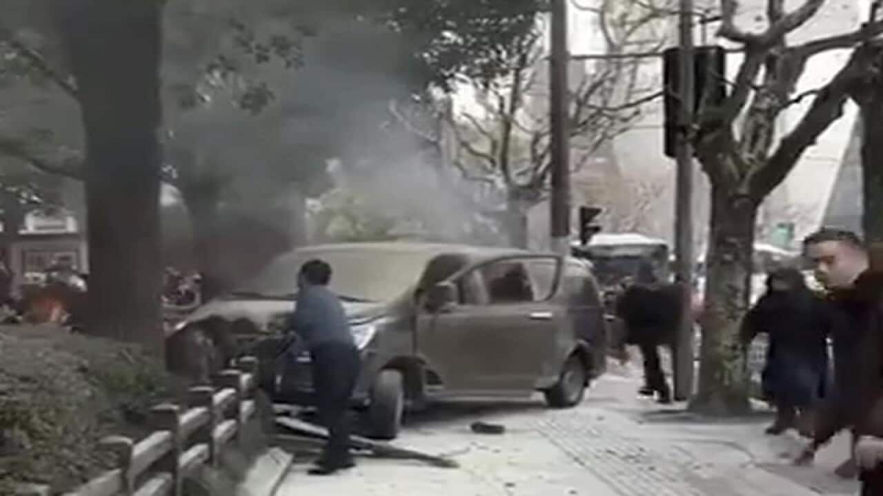 A screenshot of a minivan involved in an accident in Shanghai