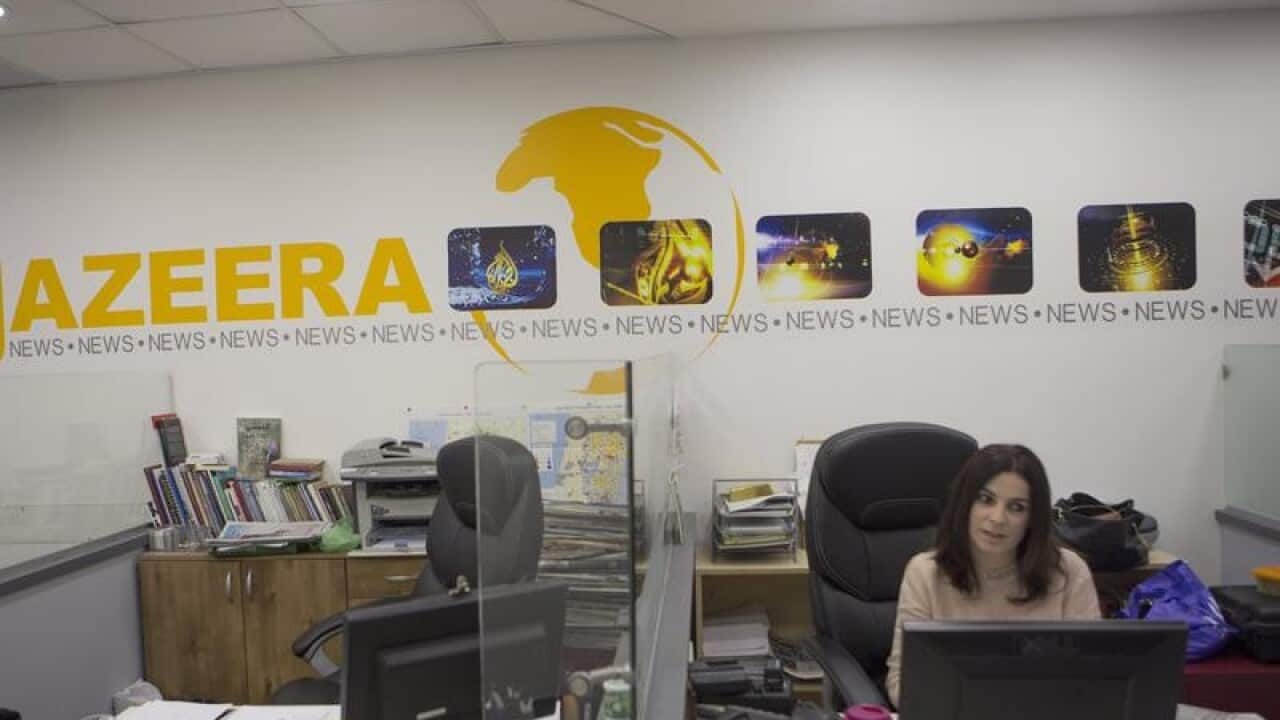 Al Jazeera satellite channel work at their Jerusalem bureau