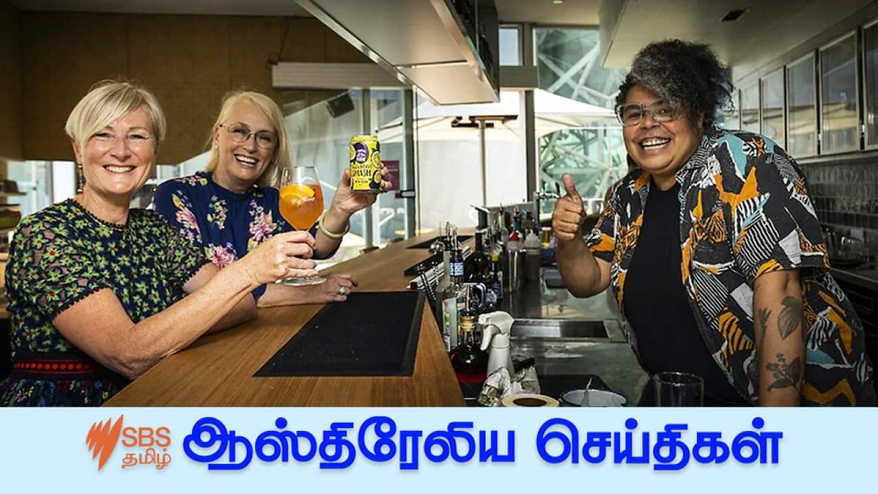 Federation Square CEO Caroline Ralphsmith, Lord Mayor Sally Capp and Big Esso owner Nornie Bero celebrate the state's exit from lockdown.