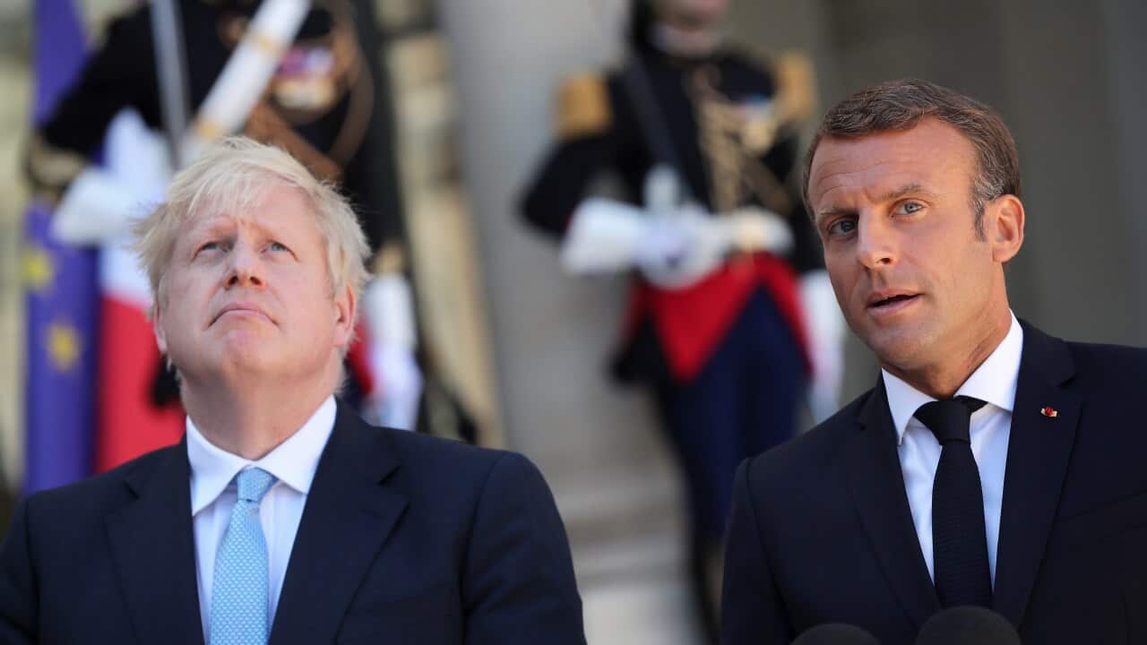 French President Emmanuel Macron and British Prime Minister Boris Johnson ive a press conference prior to their meeting at the Elysee Palace in Paris, France.