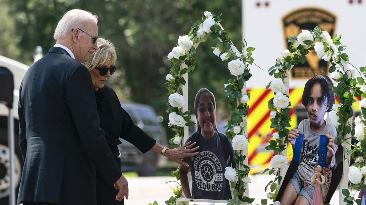 President Joe Biden and first lady Jill Biden visit a memorial at Robb Elementary School