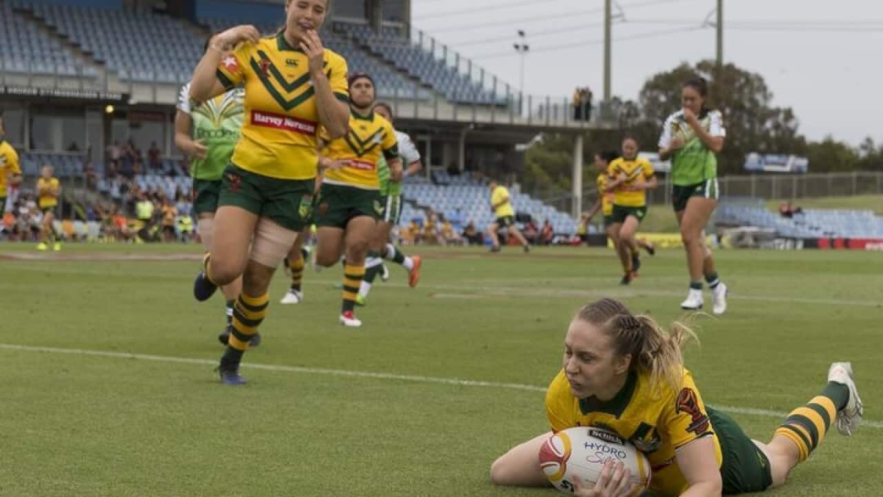Karina Brown touches down for Australia.