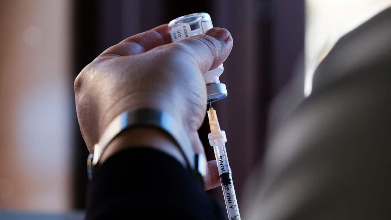 COVID-19 vaccine being drawn into a needle (AAP)