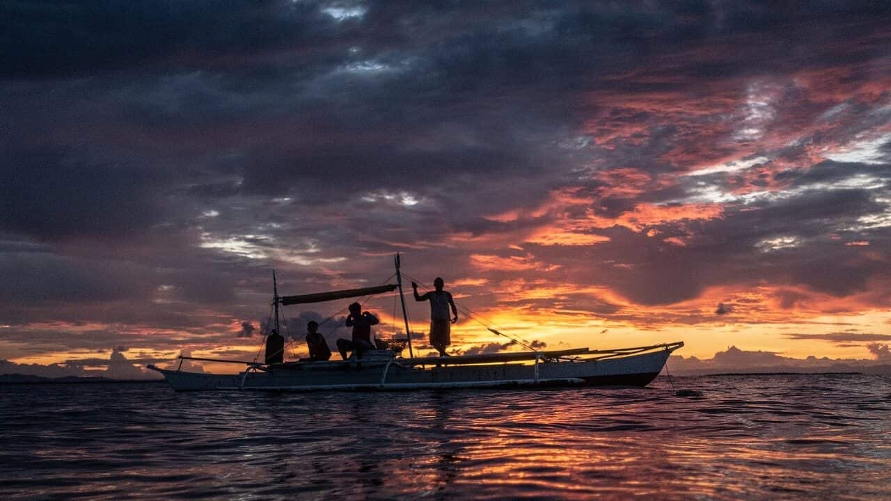 Fishermen setting out nets. Illegal fishing has decreased from the lawless heyday of the 1990s and 2000s, but enforcing the law is still difficult.