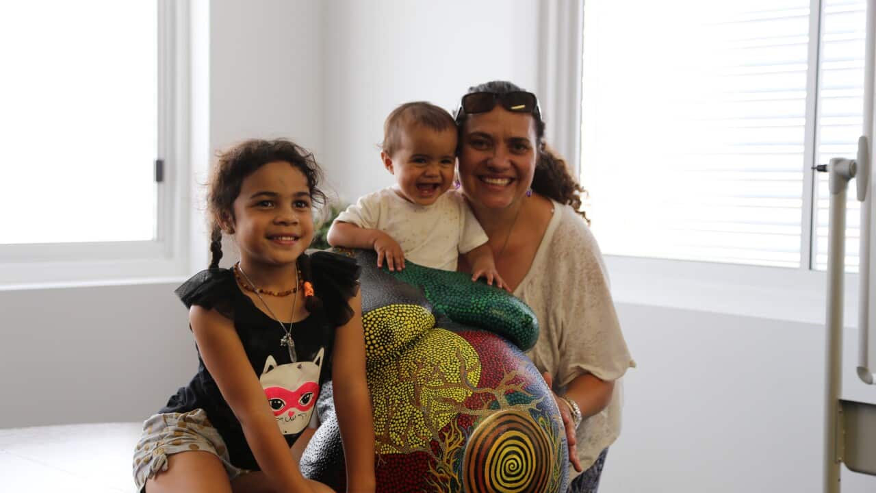 Kyleigh with belly cast and daughters