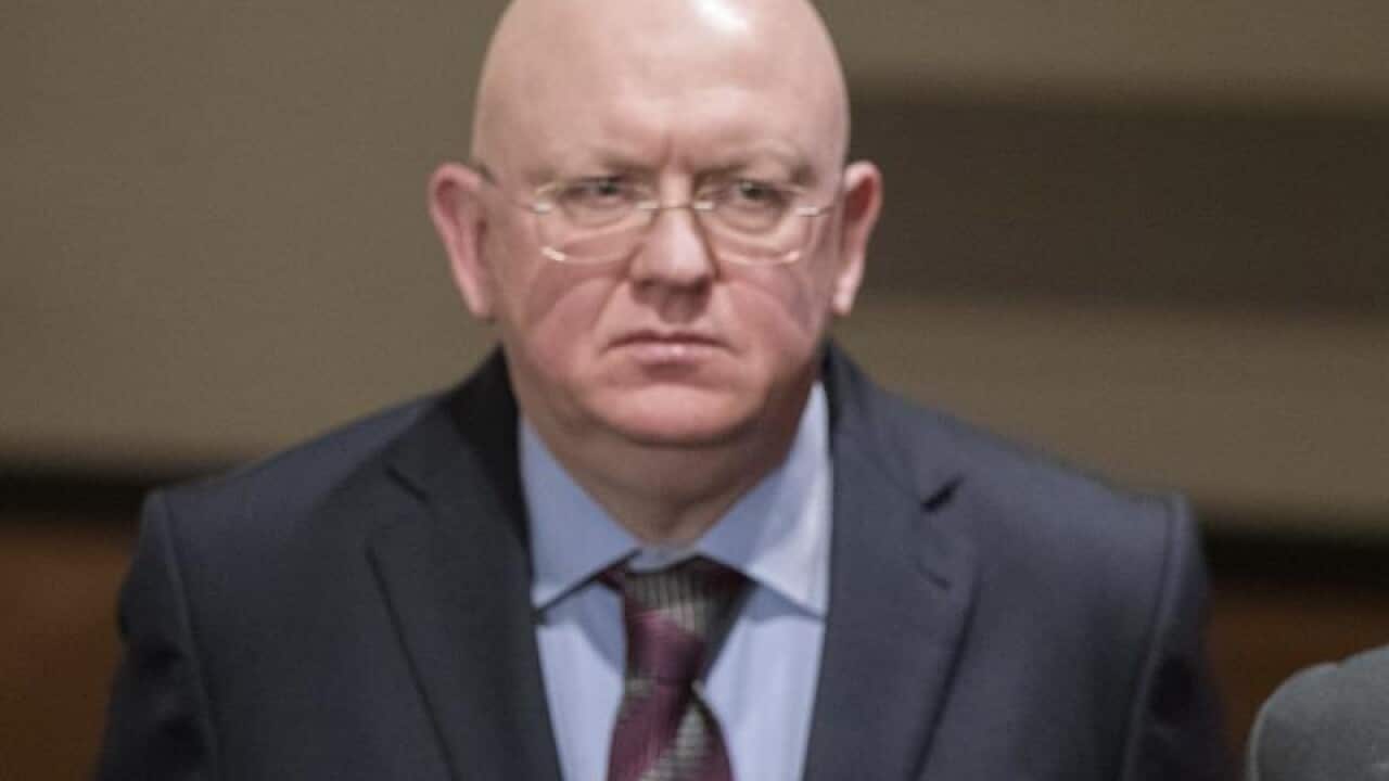 Vassily Nebenzia, left, can't rule out conflict with the US.