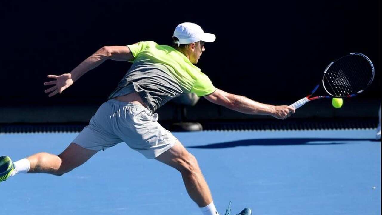 John Millman of Australia in action against Damir Dzumhur.