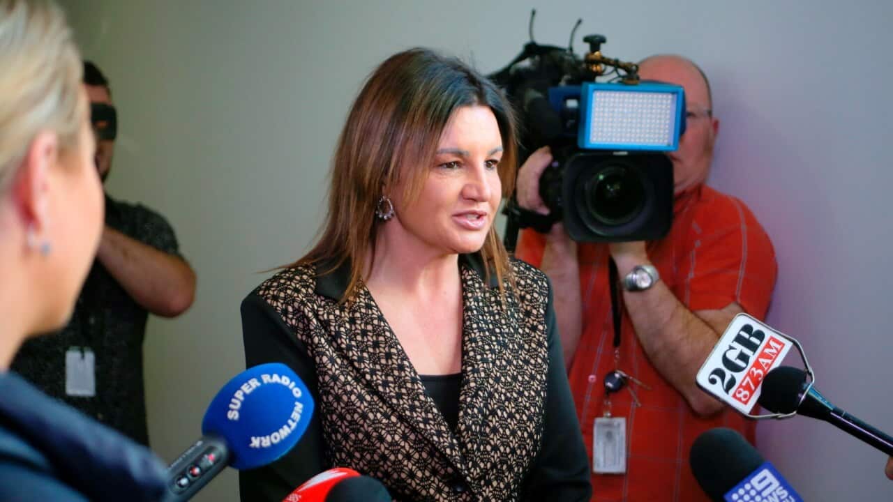 Senator Jacqui Lambie addresses reporters in Parliament House in Canberra