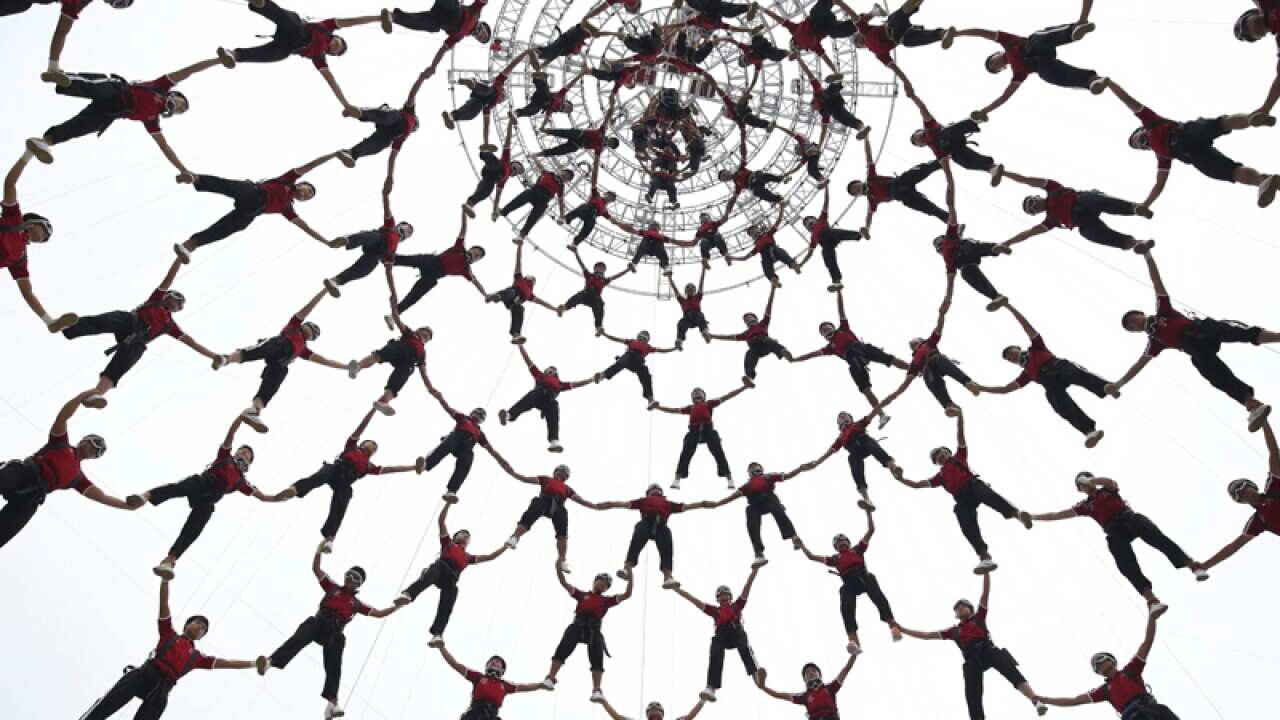 performing during a rehearsal for the opening ceremony