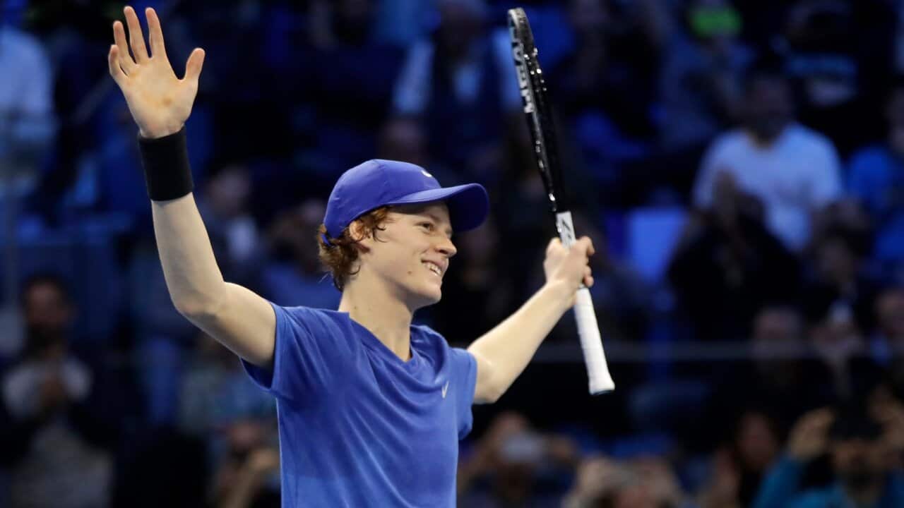 Jannik Sinner of Italy returns the ball to Alex De Minaur of Australia, during the ATP Next Gen tennis tournament final match, in Milan, Italy, Saturday, Nov. 9, 2019. (AP Photo/Luca Bruno)