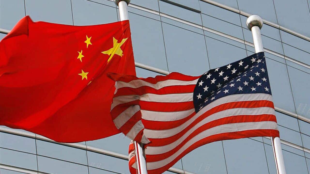 A US and a Chinese flag