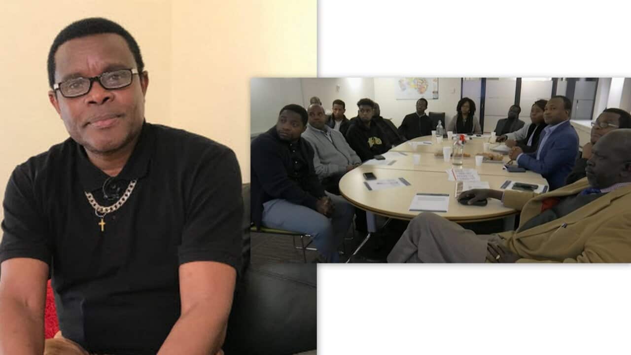 André Ntibesha on the right. He is among the participants on the left who attended the African Men Forum in Adelaide