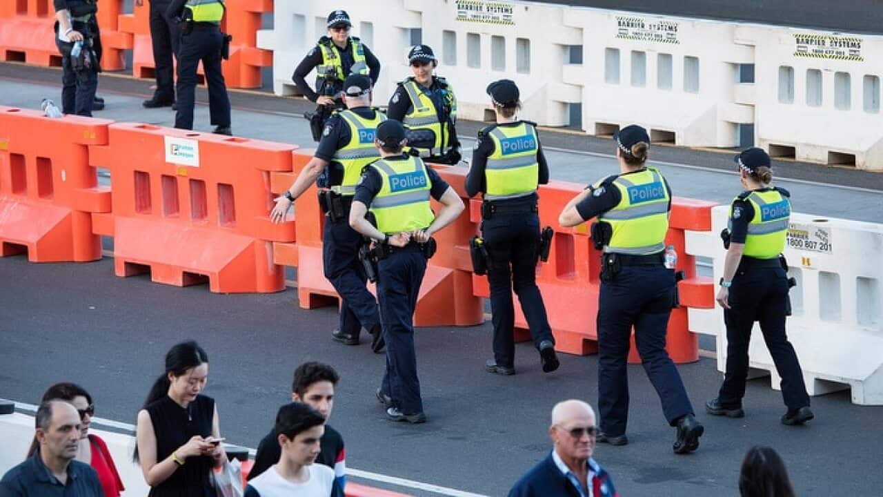 Police officers patrol the streets of Melbourne.