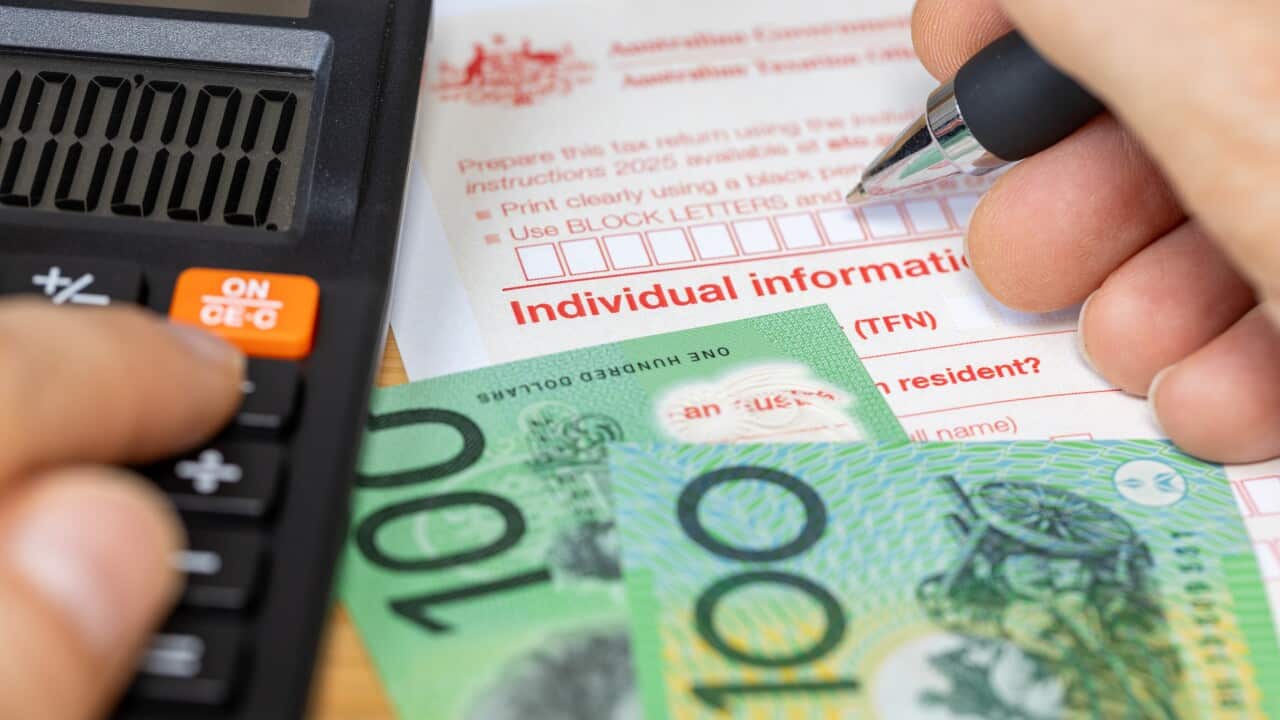 Tax return for individual. Australia tax settlement. Financial and business concept. Calculation and manual filling of the form