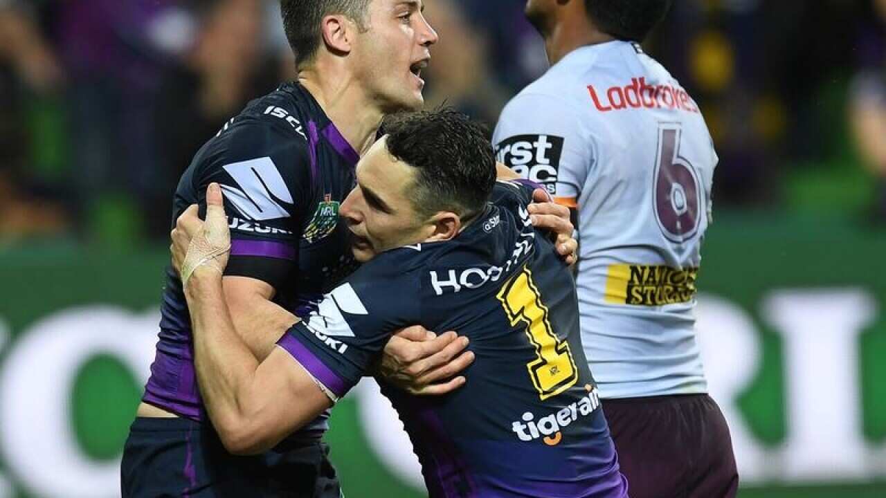 Melbourne's Cooper Cronk (l) and Billy Slater