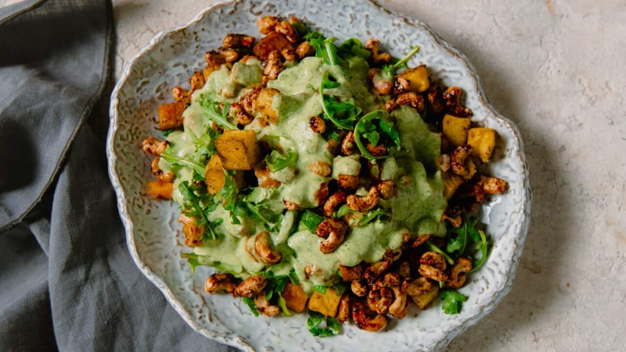 Spiced potato with maple cashews and avocado dressing