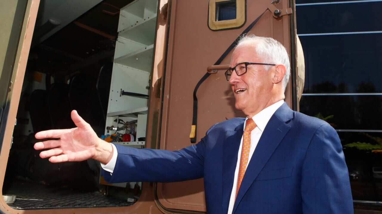 Malcolm Turnbull with a Bushmaster