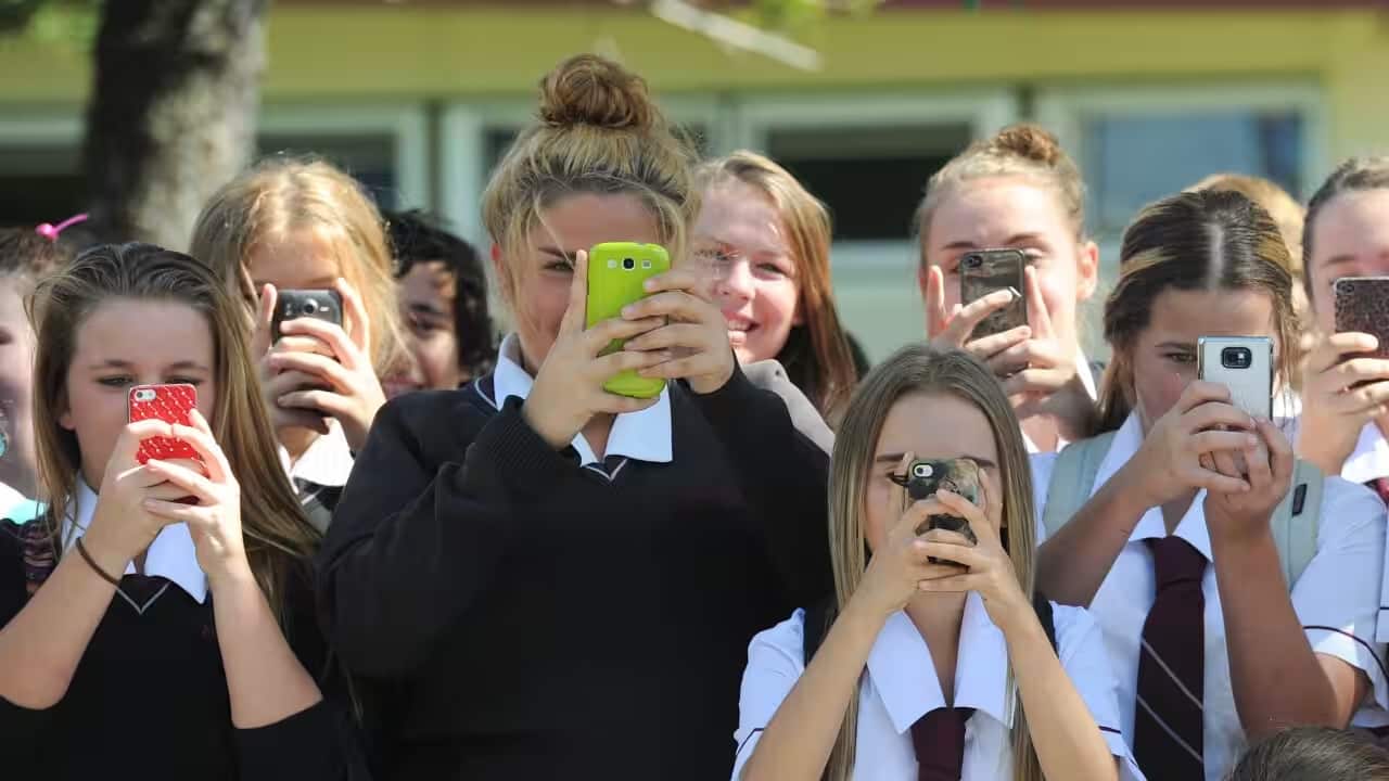Mobile phones are banned for students at NSW government high schools during school hours. Source: AAP / Dave Hunt