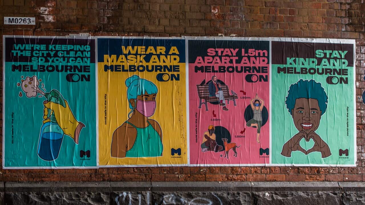 "COVID19 measures" related art work posters seen a street wall in Melbourne CBD. (Photo by Alexander Bogatyrev / SOPA Images/Sipa USA)