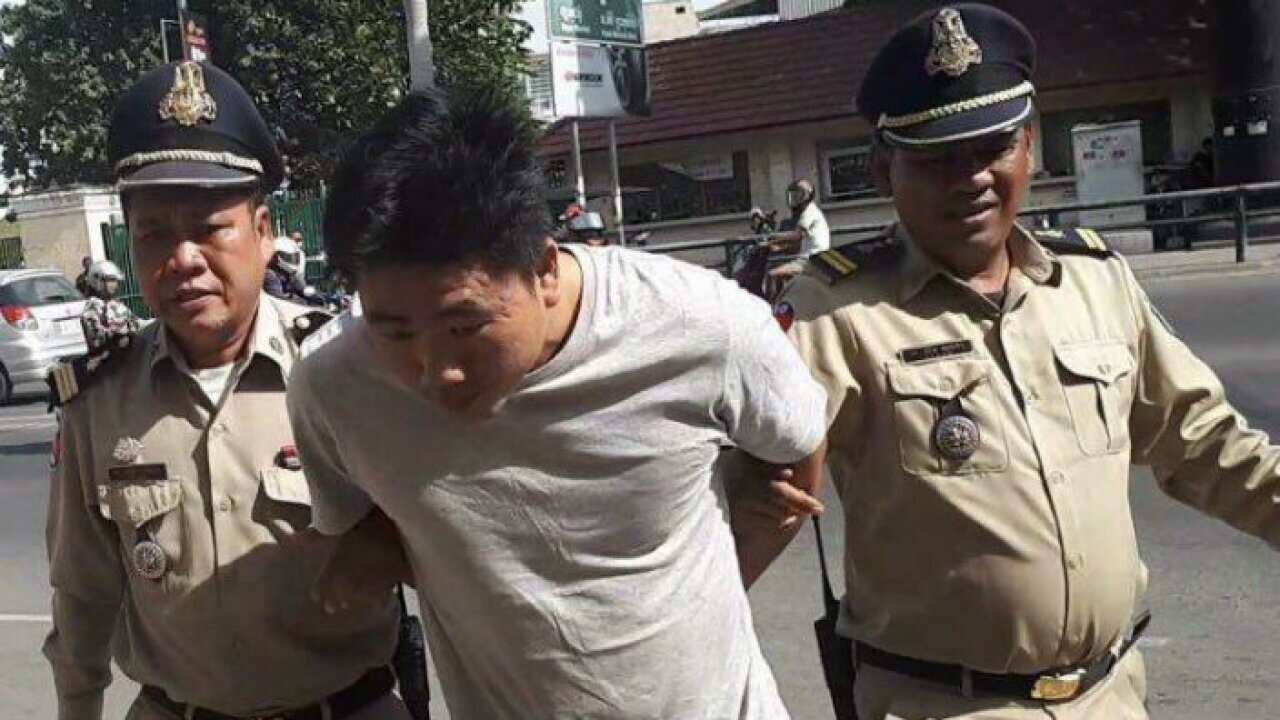 Cambodia police officer has been charged with two offenses