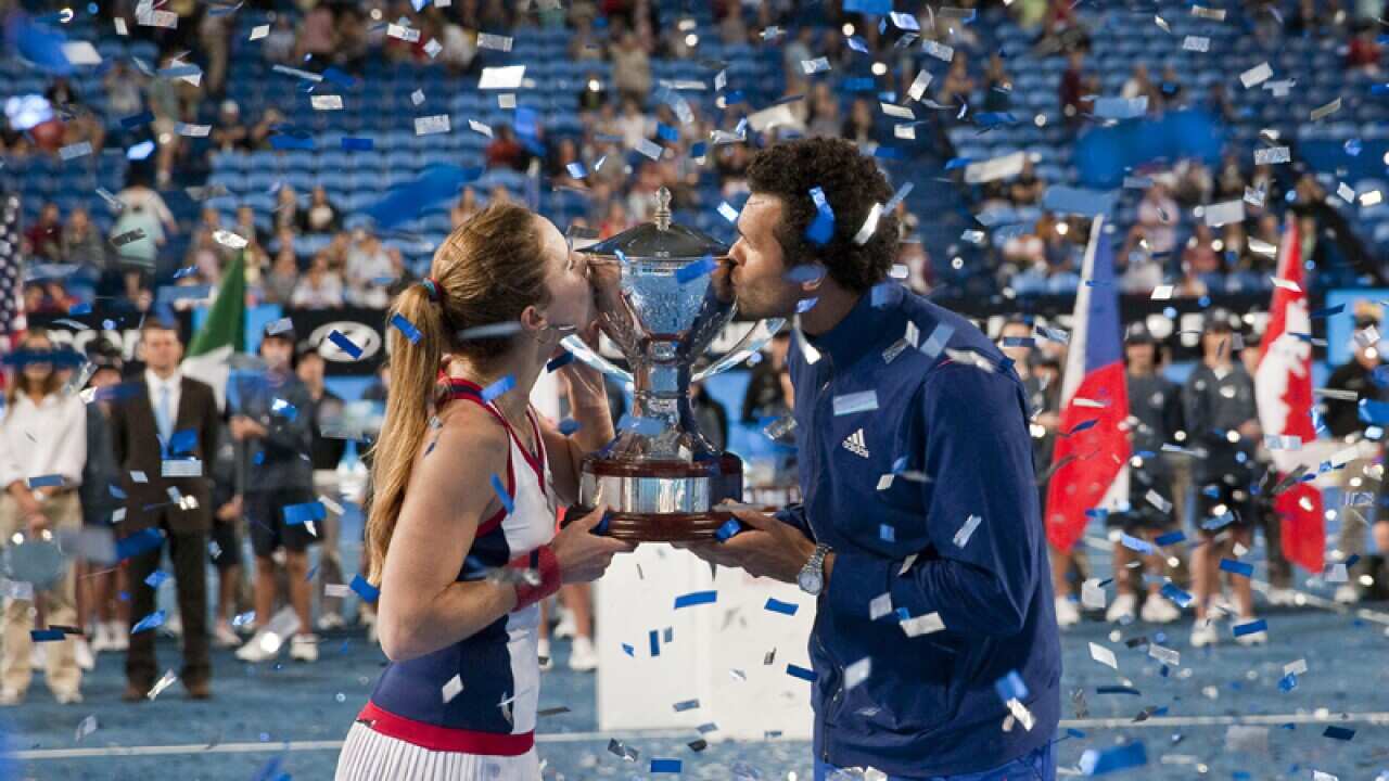 Jo-Wilfried Tsonga and Alize Cornet celebrate their Hopman Cup win