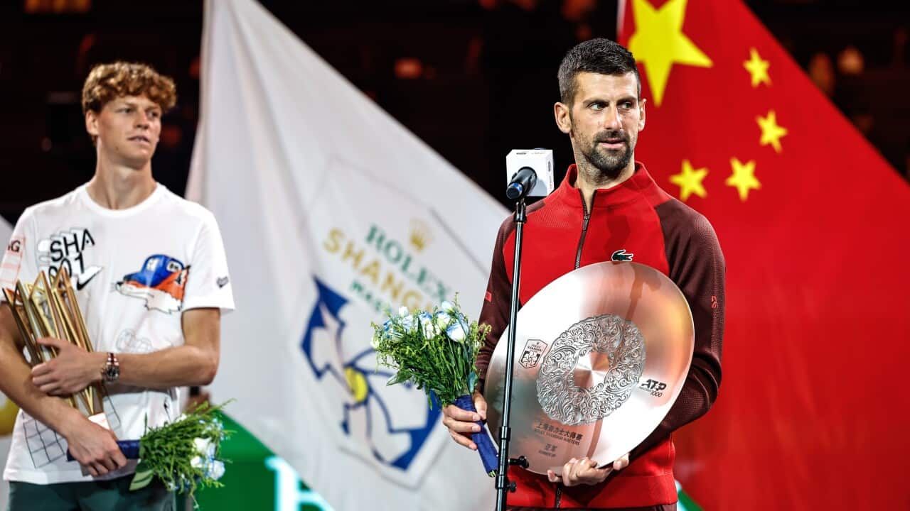 Novak Djokovic and Jannik Sinner with their trophies after the Shangai Masters finals