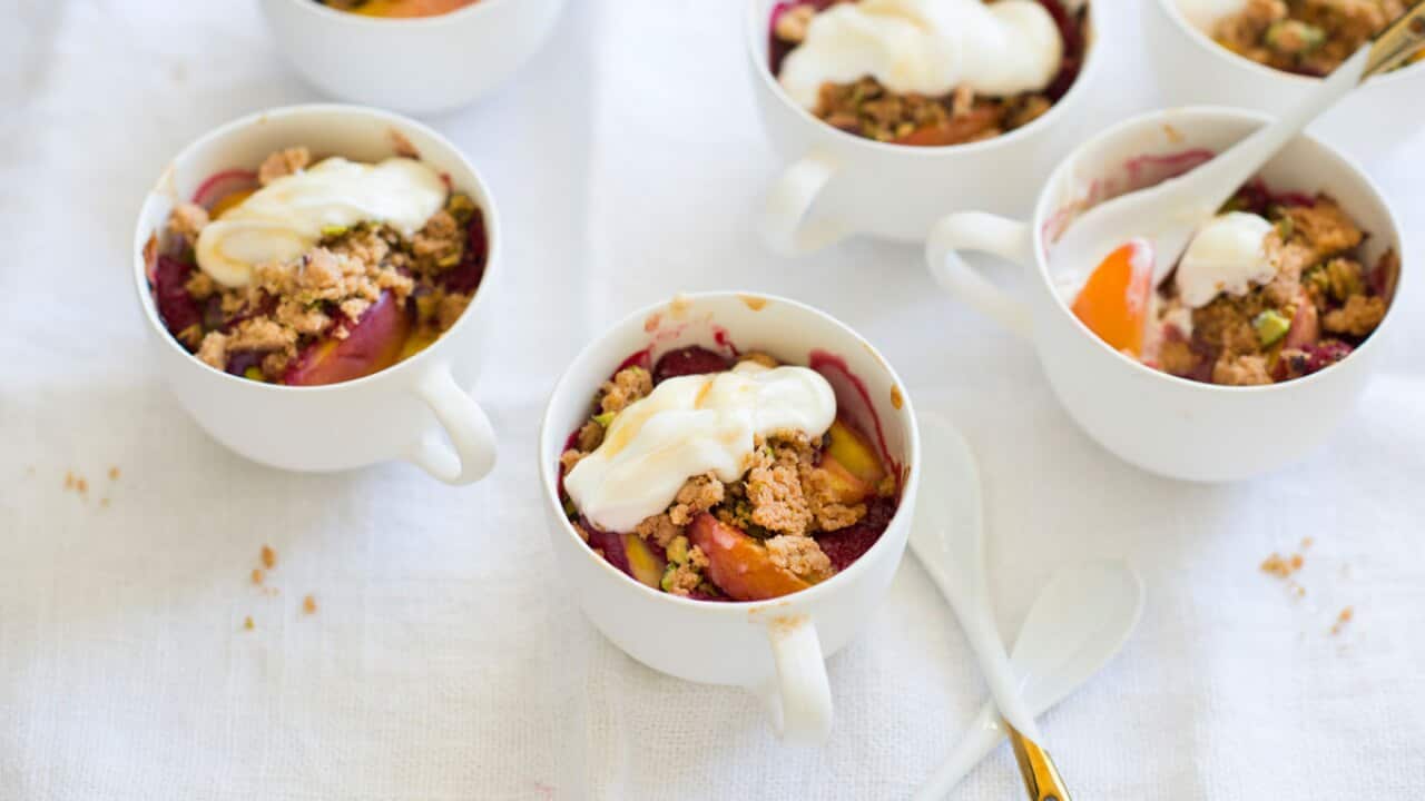 Nectarine and berry crisp with honey yoghurt